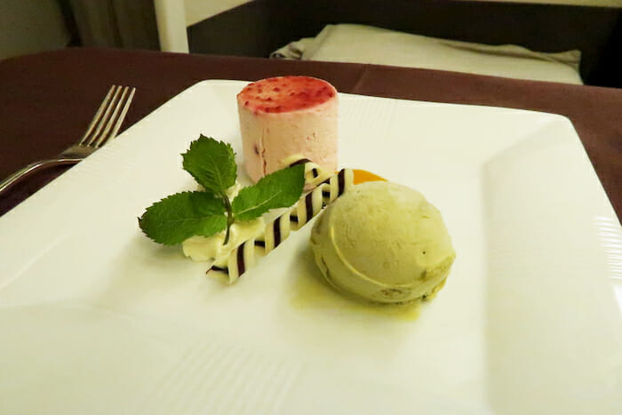 a plate of desserts on a table