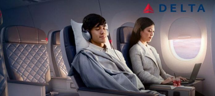 a man and woman sitting in a plane