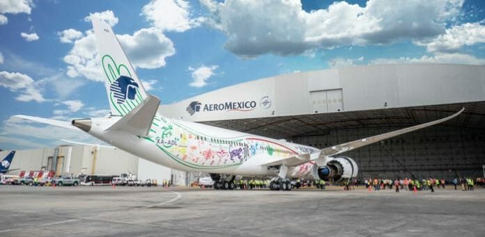 a large airplane with colorful designs on it