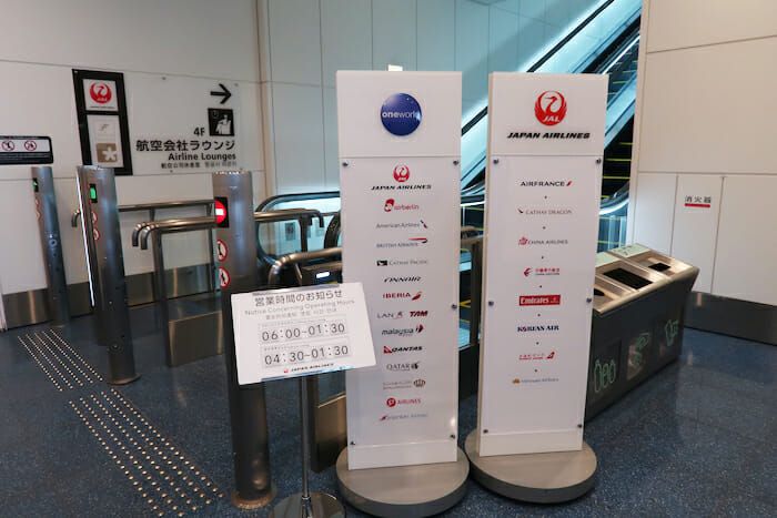 a group of signs in a airport