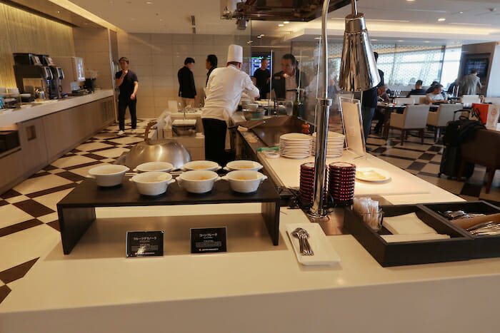 a group of people in a kitchen