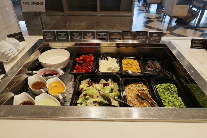 a salad bar with different types of food