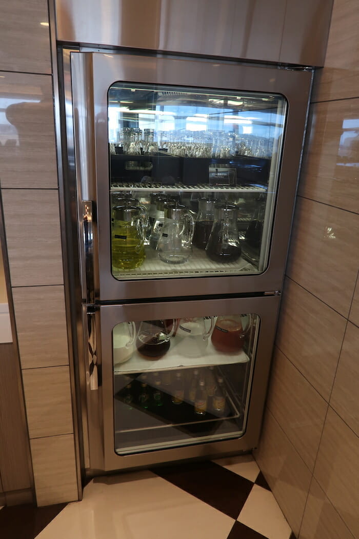 a refrigerator with glass doors