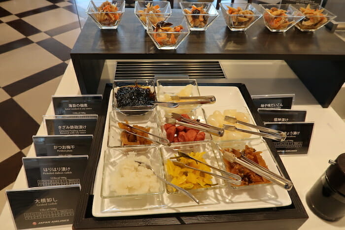 a tray of food with utensils