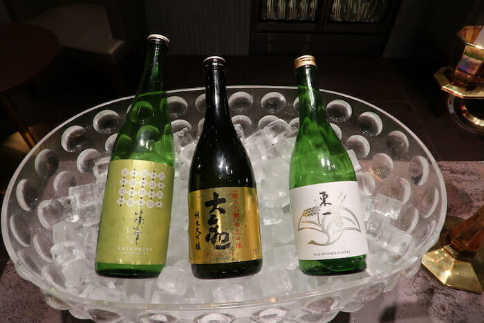 a group of bottles on ice