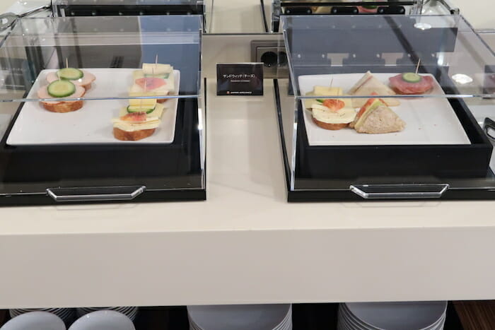 a group of sandwiches in a display case