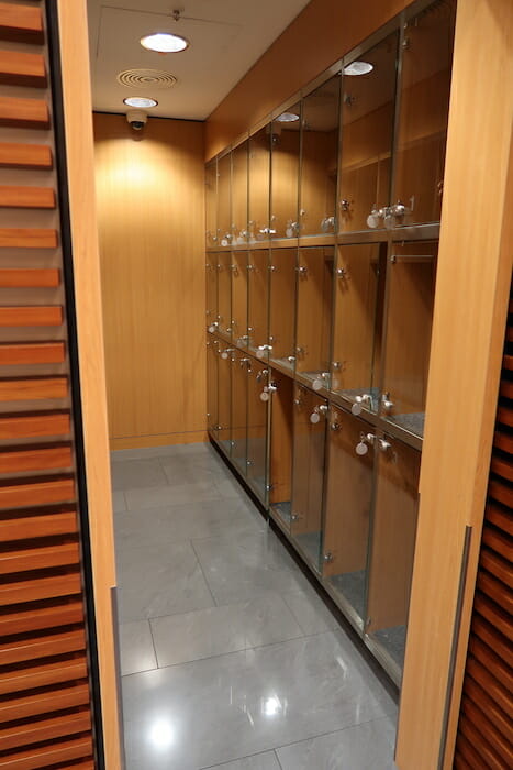 a locker room with glass doors