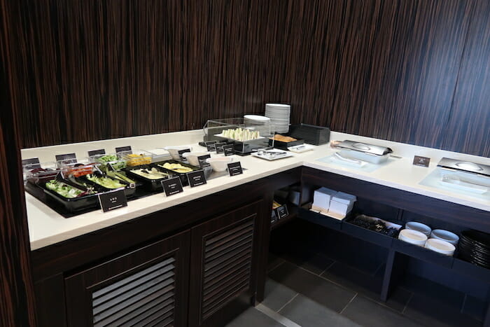 a buffet with food on the counter