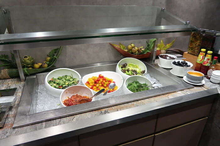 a counter with bowls of food