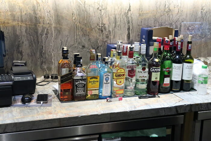 a group of bottles of alcohol on a counter