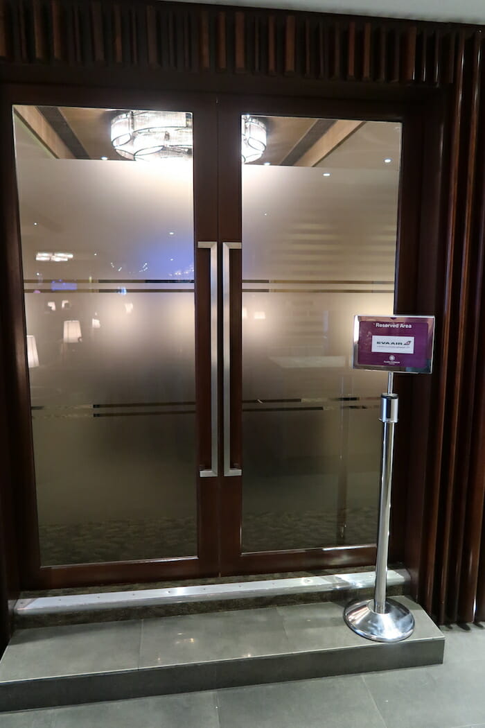 a glass doors with a sign