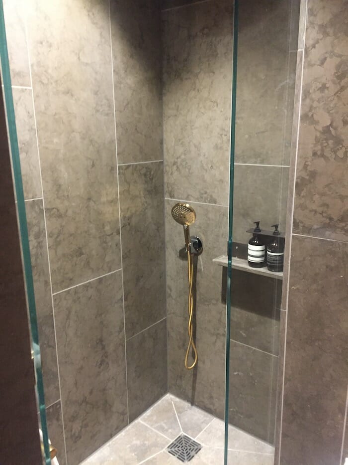 a shower with a shower head