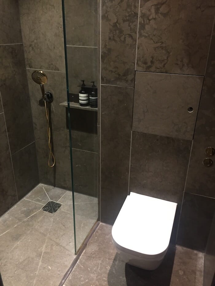 a bathroom with a glass shower