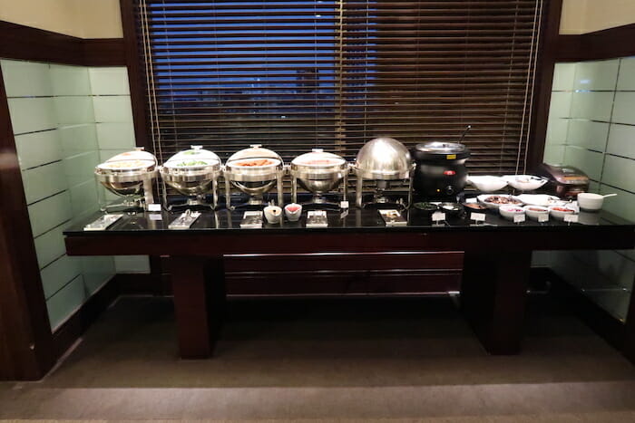 a buffet table with food on it