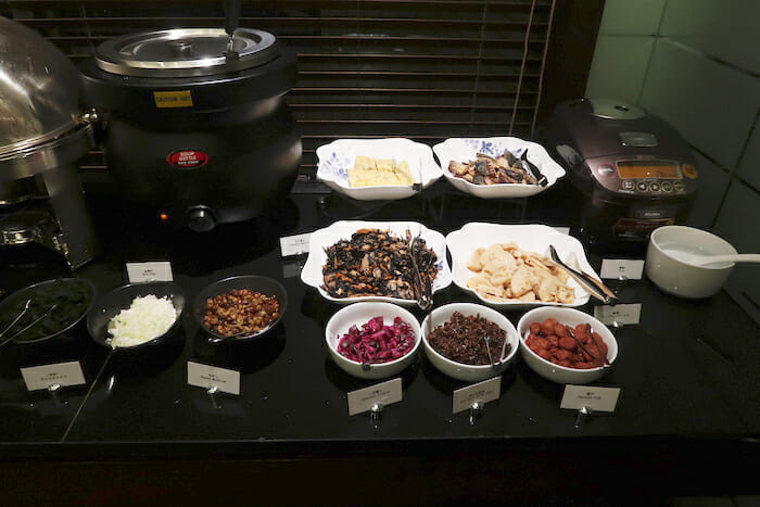 a table with bowls of food