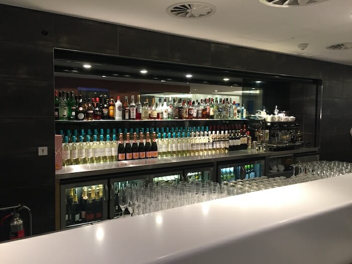 a bar with bottles of alcohol