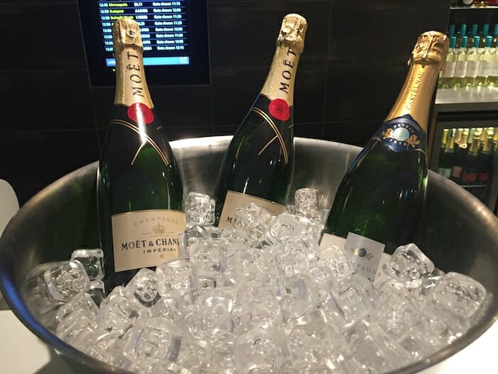 a group of bottles in a bucket of ice