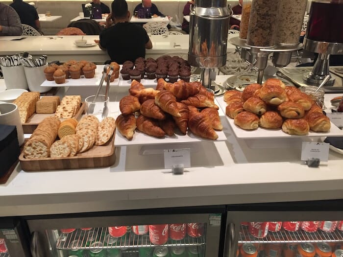 a buffet table with pastries and pastries