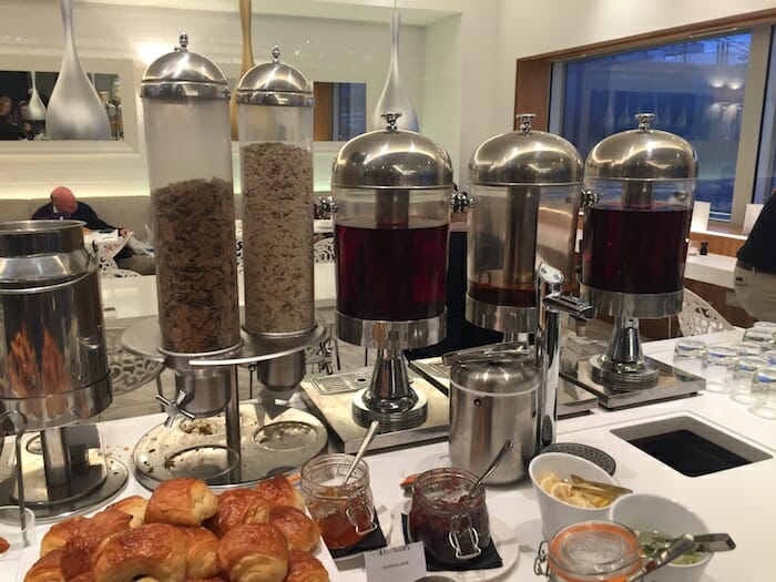 a group of food dispensers on a table