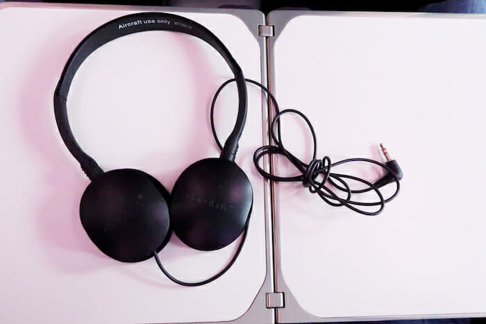 a pair of headphones on a white surface