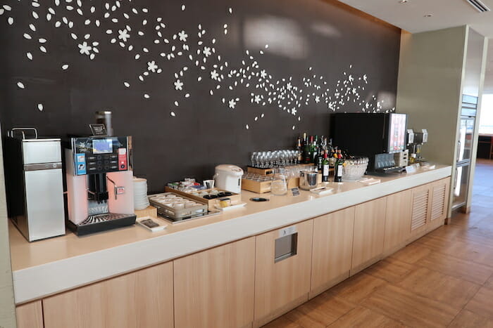 a coffee machine and coffee maker on a counter