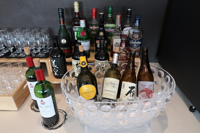 a group of bottles in a bowl of ice