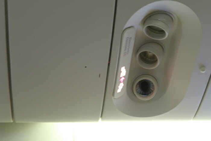 a close up of a plane's overhead light