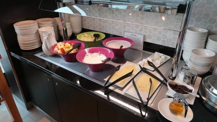 a buffet line with different food items