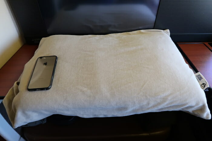 a phone on a pillow