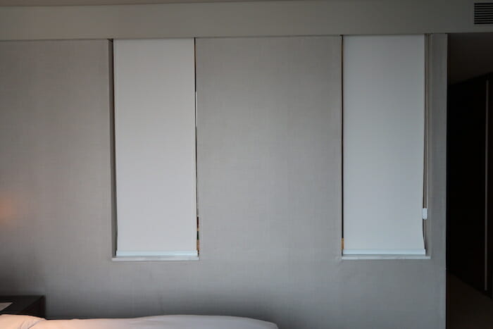 a white blinds on a wall