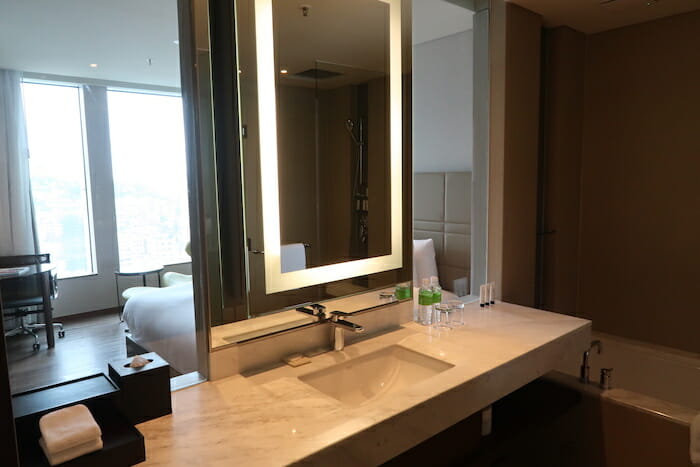 a bathroom with a large mirror