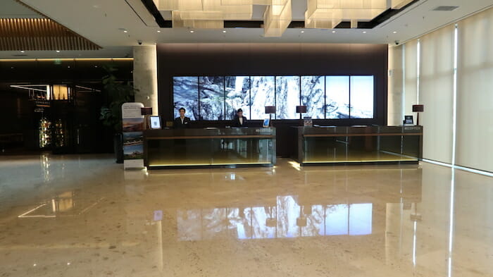 a reception desk in a hotel