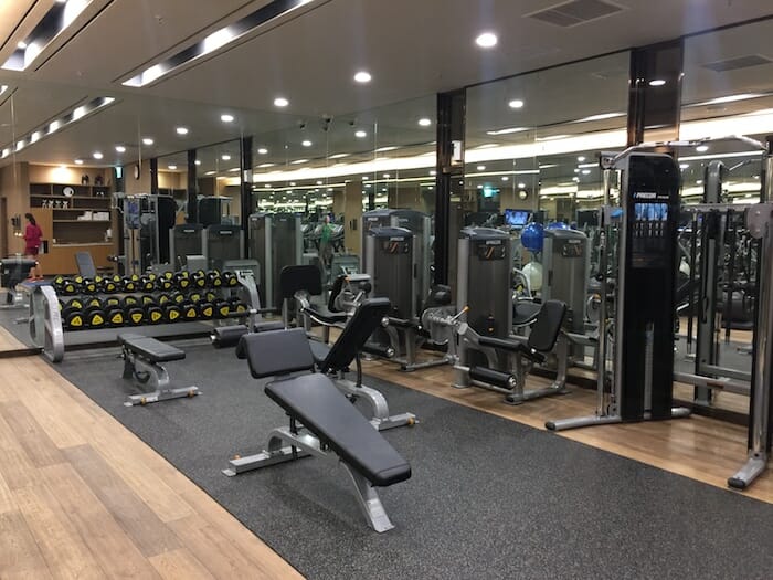 a gym with weights and exercise equipment