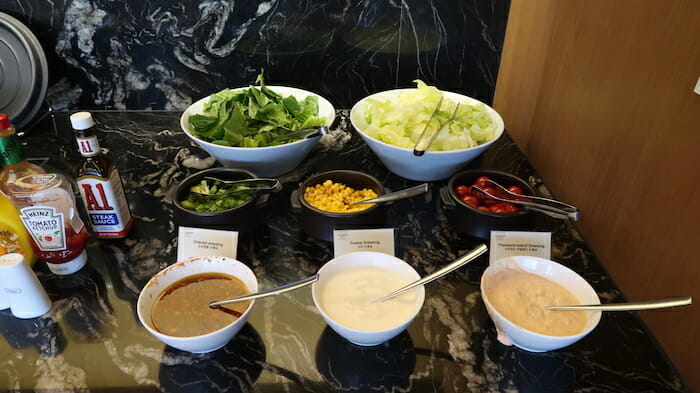 a table with bowls of food