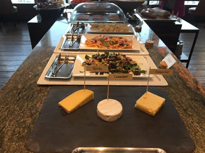 a buffet table with different types of food