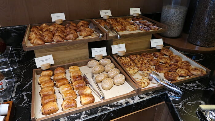 a trays of pastries on a counter