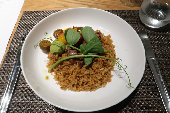 a plate of rice and vegetables