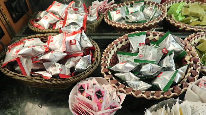 several baskets of condiments