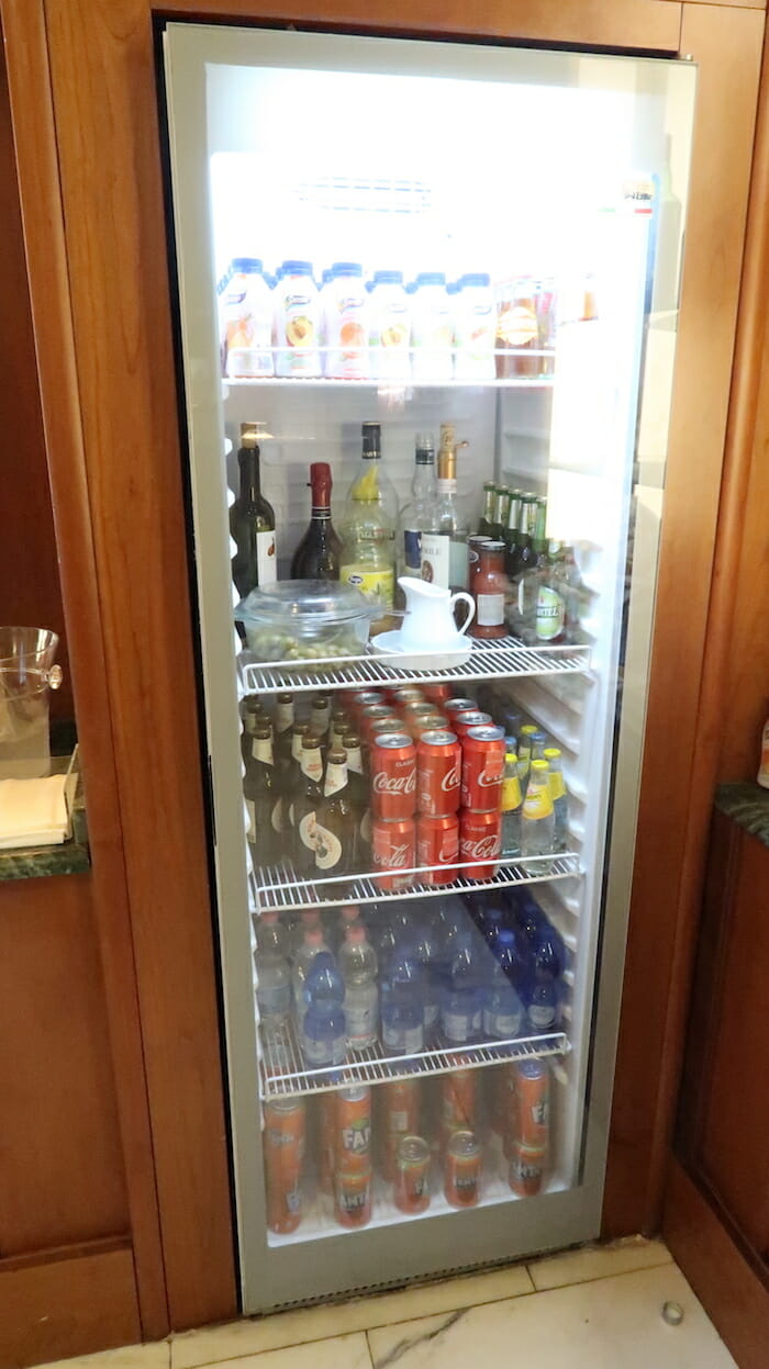 a refrigerator full of drinks and beverages