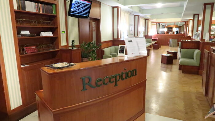 a reception desk in a hotel