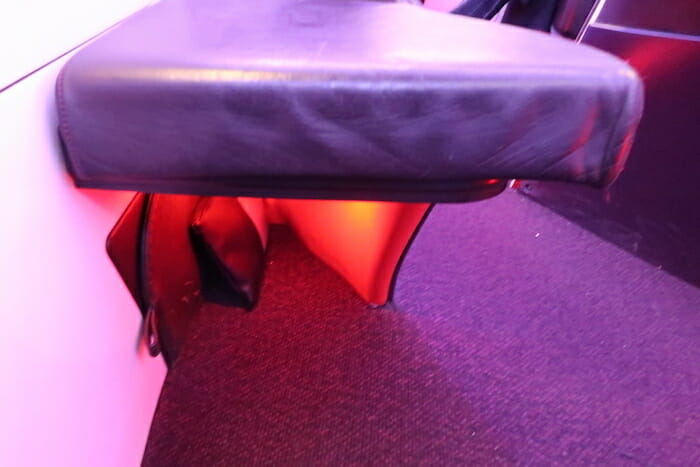 a black chair with a red light