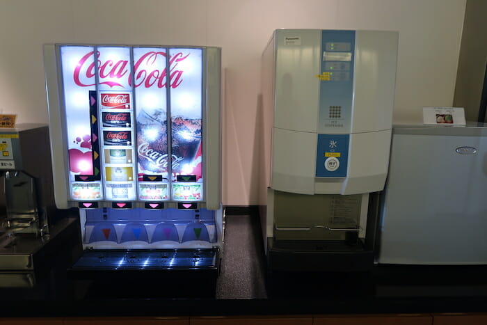 a machine with a drink dispenser