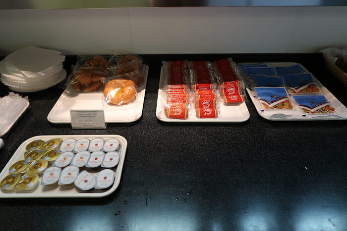 a trays of food on a counter