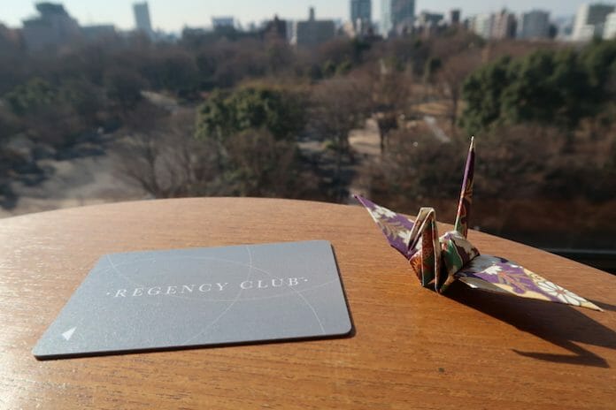 a paper crane on a table