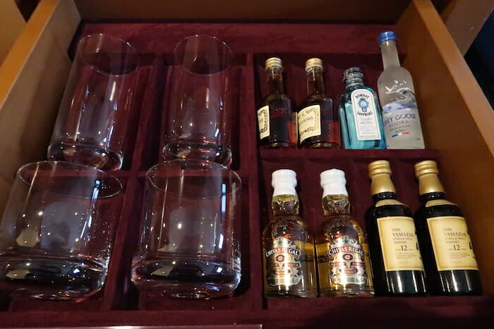 a box with glasses and bottles