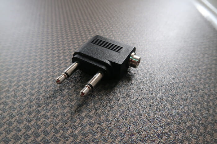 a black and silver audio adapter