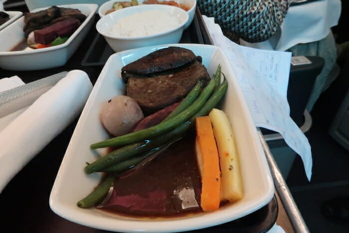 a plate of food on a tray