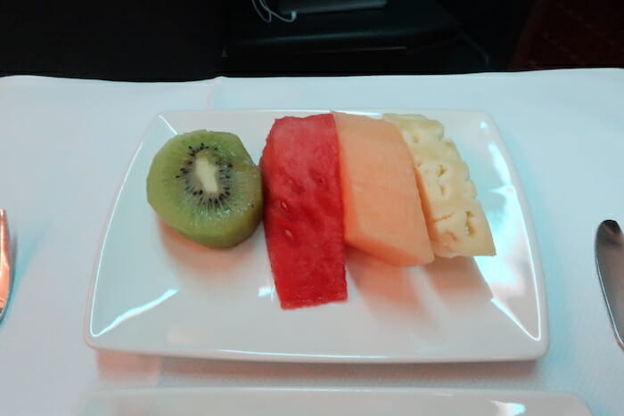 a plate of fruit on a table