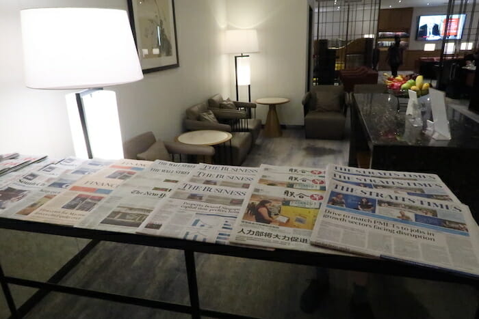 a table with newspapers on it