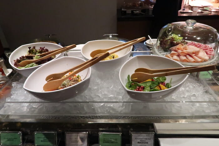 a group of bowls with food in them